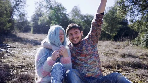 Young couple has fun and poses for the camera in mount Stock Footage 102766658