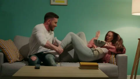 Young Couple Has Fun At Home Video stock 147363151