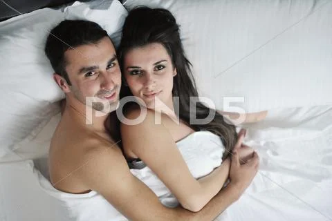 Young couple have good time in their bedroom Stock Photos