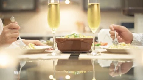 Young couple have romantic dinner with champagne. Stock Footage 77828398