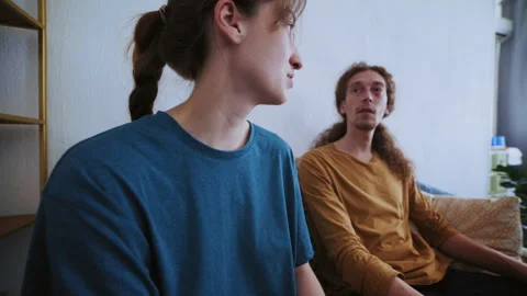 Young Couple Having Emotional Argument During Counseling Stock Footage 339615745