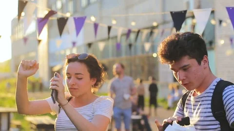 Young couple having fun dancing on a picnic against the sun Stock-Footage 78409000