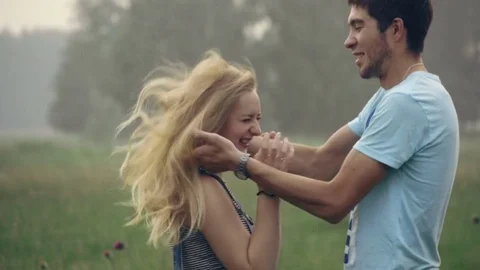 Young couple having fun in the forest Stock Footage 70200793