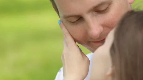Young couple having fun on the green field in the spring or summer, general plan Stock Footage 86152126