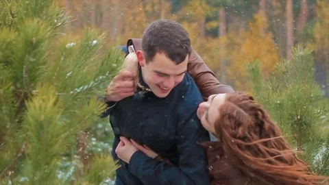 Young Couple Having Fun Outdoors in Pine Stock Footage 71565769
