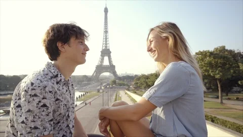 Young couple having fun in Paris city near the Eiffel Tower Stock Footage 96384554