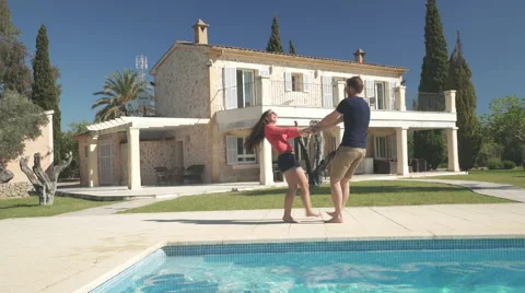 Young couple having fun on private property Stock Footage 62692423