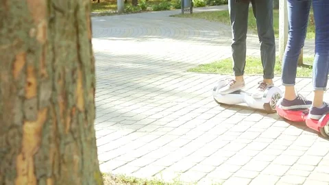 Young couple having fun with scooter 動画素材 74691153