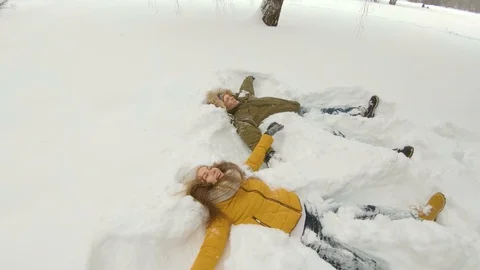 Young couple having fun in winter park Video stock 102339929