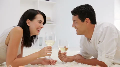 Young Couple Having Wine while Relaxing Stock Footage 913010