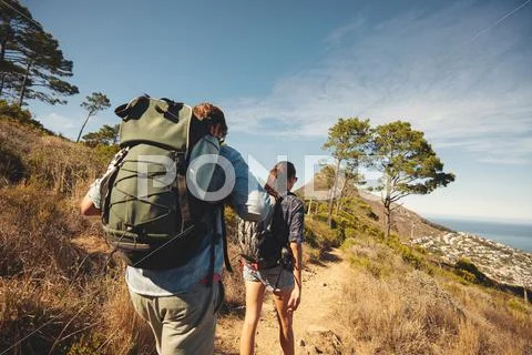 Young couple hiking in mountain Stock Photos