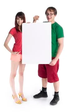 Young Couple Holding Empty White Cardboard Stock Photos