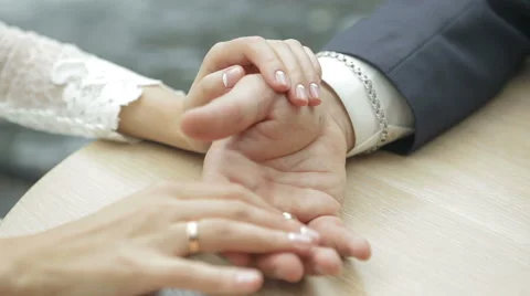 Young couple holding hands Stock Footage 65989247