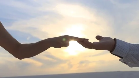 Young couple holding hands Stock Footage 74313207