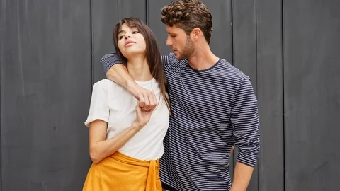 Young couple holding hands Video stock 93829897
