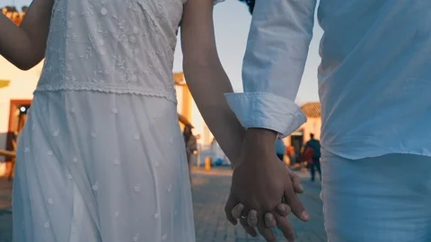Young couple holding hands 스톡 동영상 117276934