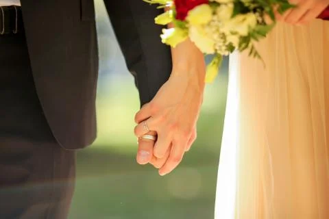 Young couple holding hands Stock Photos
