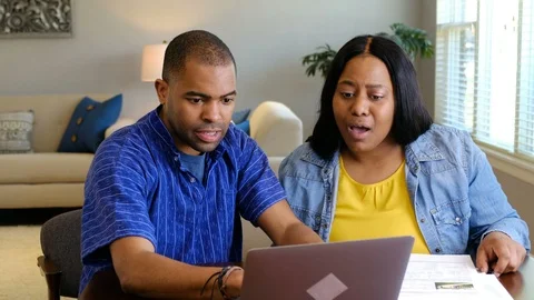 Young couple at home browsing the internet Stock Footage 107117307