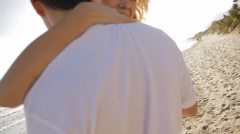 Young couple hugging on beach Stock Footage 43619083