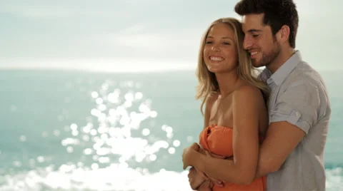 Young couple hugging on beach Video stock 43679703