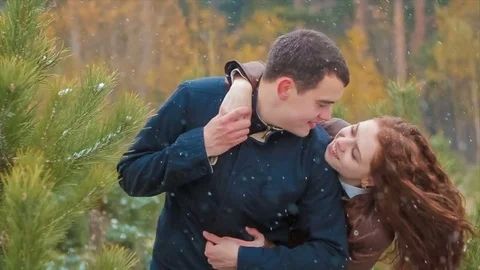 Young Couple Hugging in Coniferous Forest Stock Footage 71617409