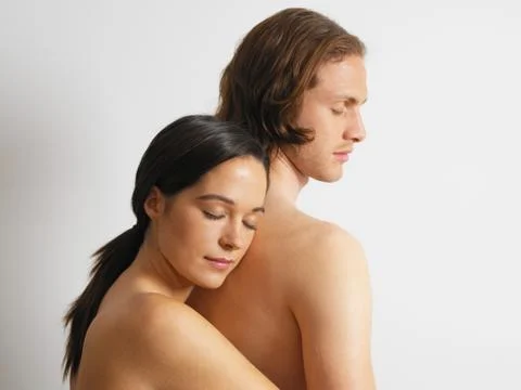 Young couple hugging Stock Photos