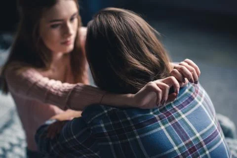 Young couple hugging Photos