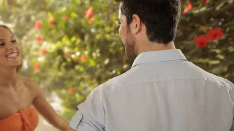 Young couple hugging with present in park Stock Footage 43679595