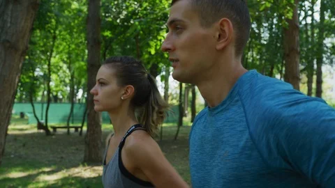 Young couple jogging Stock Footage 100033044