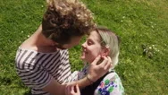 Young Couple Kissing In A City Park Stock Footage