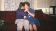 Young Couple Kissing On The Sofa-1970 Vintage 8Mm Film Stock Footage