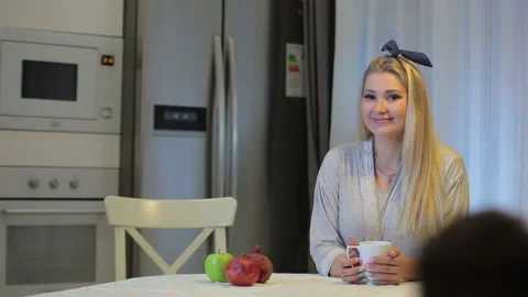 Young couple in the kitchen. drinking tea Video stock 92661056