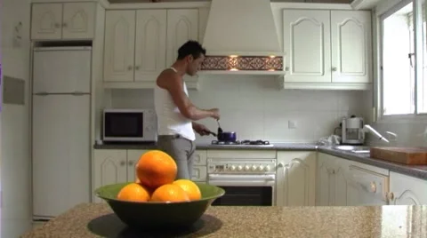 Young couple in kitchen Stock Footage 43699410