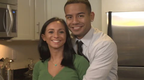 Young couple in kitchen Stock Footage 44113412