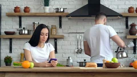 Young couple at the kitchen. Stock Footage 105409861
