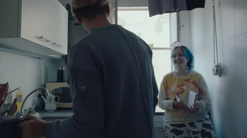 Young Couple in the Kitchen at Home Stock Footage 242299432