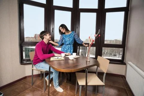 Young couple in the kitchen Stock Photos