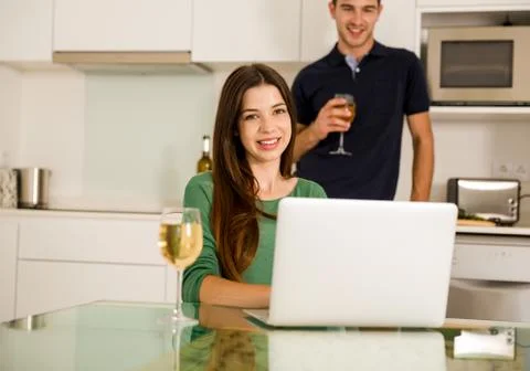 Young couple on the kitchen Stock Photos