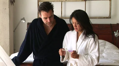 Young couple looking at birth control results with worry Video stock 916693