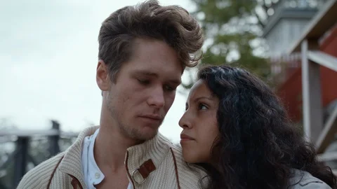 A young couple looking at the camera on a hill in Stockholm. Stock Footage 116058506