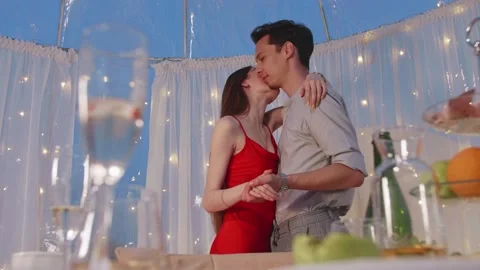 Young couple in love dancing on a date Stock Footage 154412933
