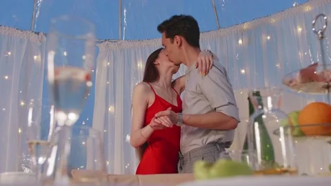 Young couple in love dancing on a date Stock Footage 154524255
