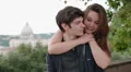 young couple in love kissing - saint peter in backgroud HD Footage