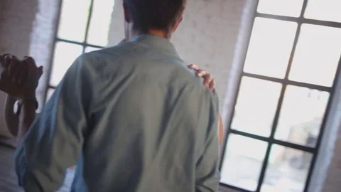 Young couple in love is learning to dance in the studio Stock Footage 70199418