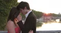 a young couple of lovers kissing at sunset - with of St Peter - sunshine HD Footage