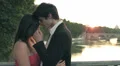a young couple of lovers kissing at sunset - with of St Peter - sunshine HD Footage