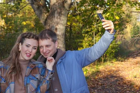 A young couple makes a self-portrait Stock Photos
