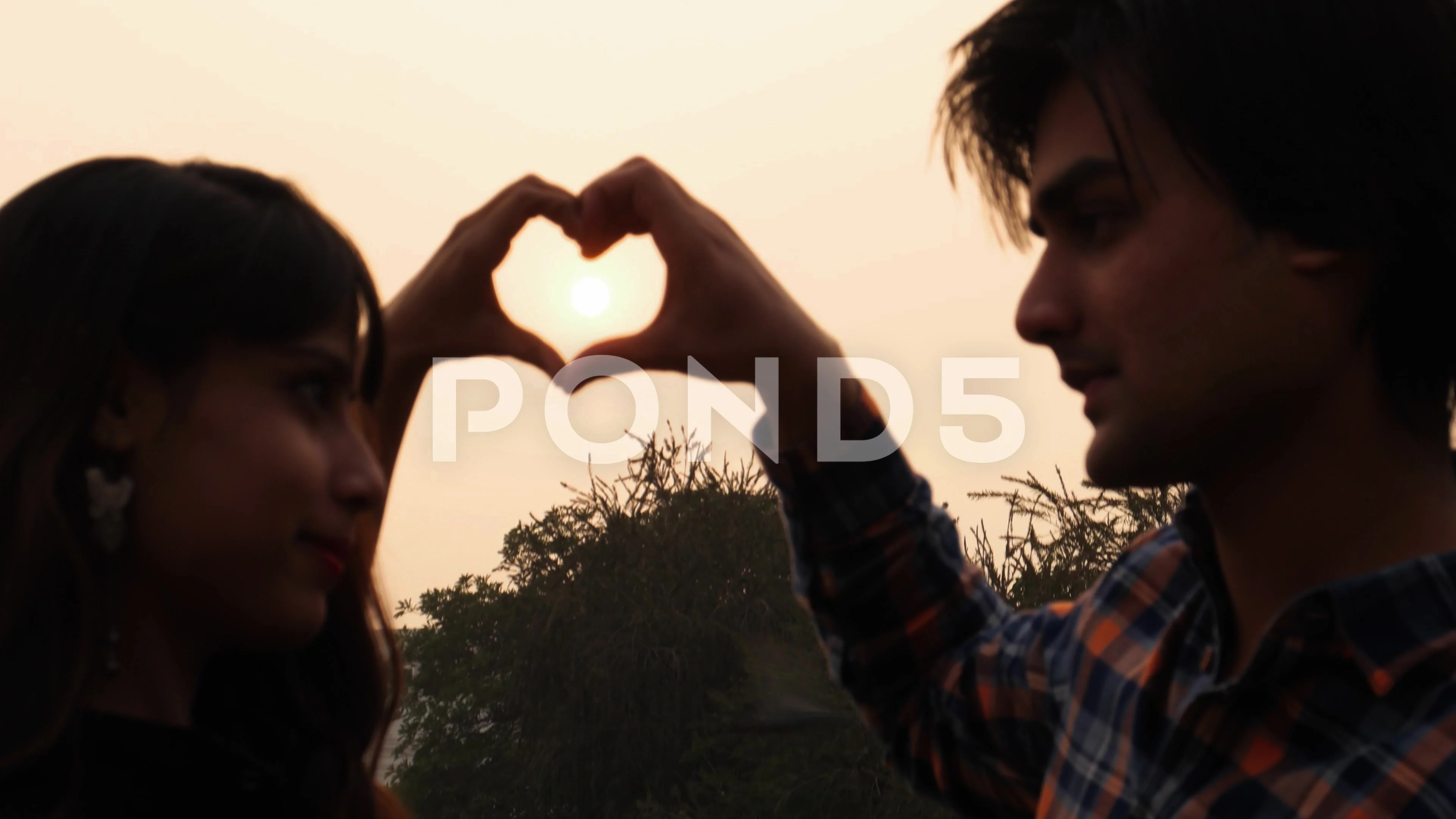 Young Couple Making Heart Shape With The Stock Video Pond5