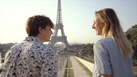 Young couple making heart shape finger frame with hands  Stock Footage 96393576