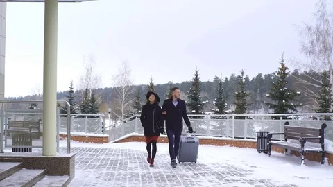 A young couple moves in at the hotel Stock Footage